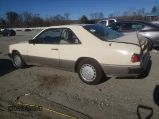 1988 Mercedes-Benz 300 with VIN WDBEA50D9JA698251, listed as a Copart auction lot 46977055 with 107,949 mi miles and Salvage Title. Bid and sale history available at DreamBid. Image 2.