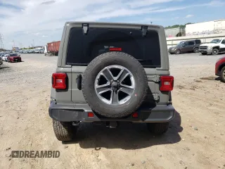 2022 Jeep Wrangler Unlimited Sahara Altitude with VIN 1C4HJXEG4NW248402, listed as a Copart auction lot 63052465 with 36,732 mi miles and Salvage title. Bid and sale history available at DreamBid. Image 6.