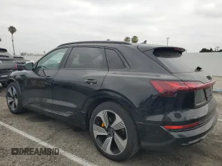 2022 Audi e-tron Premium Plus with VIN WA1LAAGE4NB014605, listed as a Copart auction lot 61127385 with 26,355 mi miles and Salvage title. Bid and sale history available at DreamBid. Image 2.