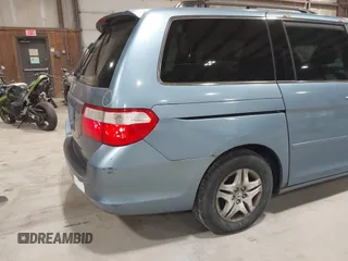 2006 Honda Odyssey EX-L with VIN 5FNRL38726B078467, listed as a IAAI auction lot 41874268 with 178,580 mi miles and . Bid and sale history available at DreamBid. Image 14.