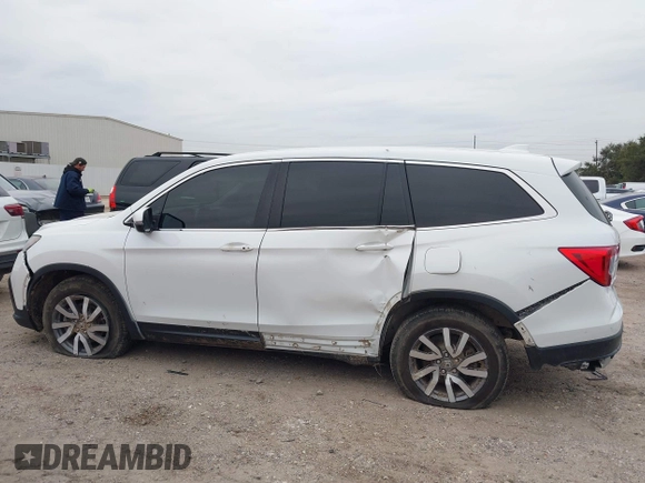 2020 Honda Pilot EX-L with VIN 5FNYF5H55LB029238, listed as a IAAI auction lot 41330490 with 116,787 mi miles. Bid and sale history available at carsss.com. Image 14.