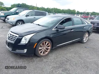 2013 Cadillac XTS Luxury z VIN 2G61P5S34D9183065, wystawiony jako IAAI lot #42665741 z przebiegiem 209 585 mil mil oraz . Historia ofert i sprzedaży dostępna na DreamBid. Obrazek 2.