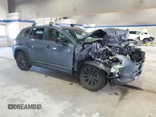 2024 Mazda CX-50 S Preferred with VIN 7MMVABBM5RN195804, listed as a Copart auction lot 50973435 with 6,817 mi miles and Salvage Title. Bid and sale history available at DreamBid. Image 4.