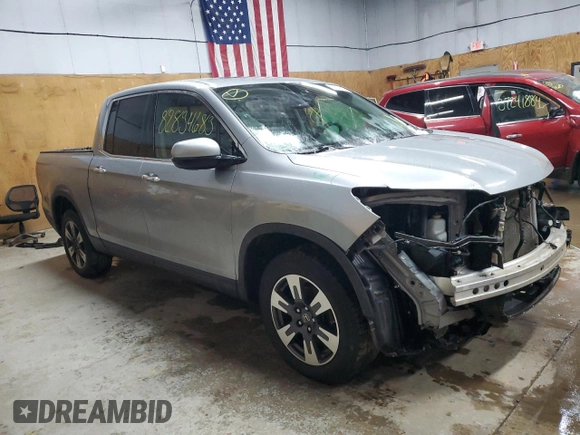 2017 Honda Ridgeline RTL-E with VIN 5FPYK3F71HB030020, listed as a Copart auction lot 82834683 with 102,111 mi miles and Salvage title. Bid and sale history available at DreamBid. Image 4.