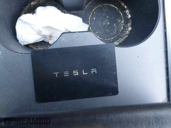 2023 Tesla Model 3 with VIN 5YJ3E1EA4PF427022, listed as a IAAI auction lot 42465964 with 169,346 mi miles and . Bid and sale history available at DreamBid. Image 11.