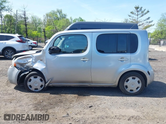 2011 Nissan Cube S z VIN JN8AZ2KR1BT205110, wystawiony jako IAAI lot #42152109 z przebiegiem 92 493 mil mil oraz . Historia ofert i sprzedaży dostępna na DreamBid. Obrazek 13.