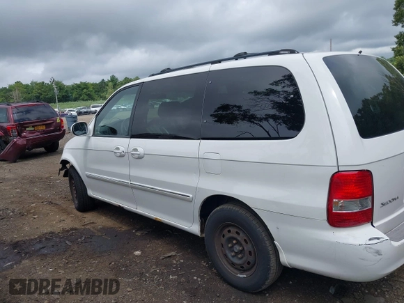 2004 Kia Sedona LX with VIN KNDUP131446493787, listed as a IAAI auction lot 40004348 with 168,374 mi miles. Bid and sale history available at carsss.com. Image 14.