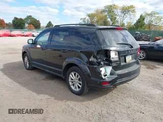 2013 Dodge Journey SXT with VIN 3C4PDDBG7DT553130, listed as a IAAI auction lot 40570369 with Not Provided miles and . Bid and sale history available at DreamBid. Image 3.