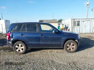 2012 Suzuki Grand Vitara Premium z VIN JS3TD0D63C4100625, wystawiony jako IAAI lot #40462478 z przebiegiem 116 027 mil mil oraz . Historia ofert i sprzedaży dostępna na DreamBid. Obrazek 13.