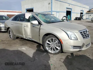 2014 Cadillac XTS Luxury with VIN 2G61M5S31E9314477, listed as a Copart auction lot 43562705 with 136,469 mi miles and Salvage Title. Bid and sale history available at DreamBid. Image 4.