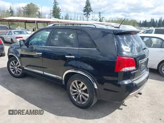 2012 Kia Sorento SX with VIN 5XYKWDA26CG258262, listed as a IAAI auction lot 42068704 with 124,832 mi miles. Bid and sale history available at carsss.com. Image 3.