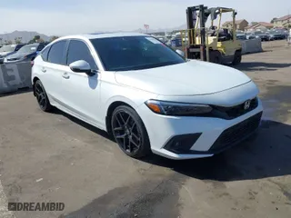 2023 Honda Civic Hatchback Sport Touring with VIN 19XFL1H8XPE001868, listed as a IAAI auction lot 41696926 with 37,051 mi miles. Bid and sale history available at carsss.com. Image 1.