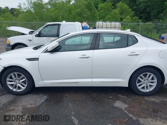 2013 Kia Optima LX z VIN KNAGM4A72D5366828, wystawiony jako IAAI lot #42106525 z przebiegiem 159 564 mil mil oraz . Historia ofert i sprzedaży dostępna na DreamBid. Obrazek 14.