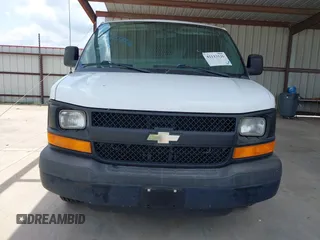2013 Chevrolet Express Cargo Van with VIN 1GCWGFBAXD1168680, listed as a IAAI auction lot 42113126 with 162,376 mi miles. Bid and sale history available at carsss.com. Image 11.