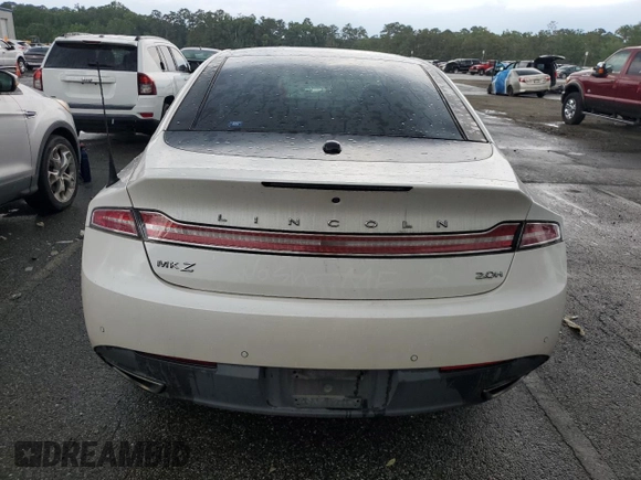 2013 Lincoln MKZ Hybrid с VIN 3LN6L2LU1DR826692, выставлен на аукционе Copart как лот 56460445 с пробегом 125 728 миль миль и Списание • Salvage title. История ставок и продаж доступна на DreamBid. Изображение 6.