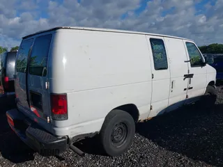 2002 Ford Econoline Cargo with VIN 1FTRE142X2HA95262, listed as a IAAI auction lot 39771693 with 204,642 mi miles. Bid and sale history available at carsss.com. Image 4.