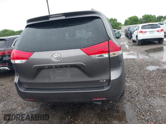 2014 Toyota Sienna XLE with VIN 5TDYK3DC0ES502482, listed as a IAAI auction lot 41910683 with 151,330 mi miles. Bid and sale history available at carsss.com. Image 17.