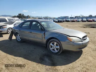 2002 Ford Taurus SE Standard with VIN 1FAFP53U12G271134, listed as a Copart auction lot 51671555 with 65,311 mi miles and Salvage title. Bid and sale history available at DreamBid. Image 4.