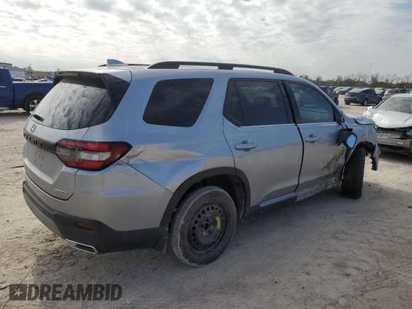 2023 Honda Pilot Touring with VIN 5FNYG2H73PB000923, listed as a Copart auction lot 41459755 with 39,829 mi miles and Salvage title. Bid and sale history available at DreamBid. Image 3.