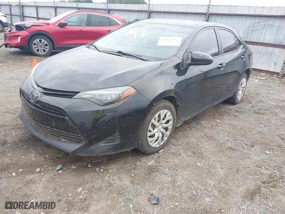 2019 Toyota Corolla L with VIN 5YFBURHE4KP905206, listed as a IAAI auction lot 40828883 with 122,982 mi miles. Bid and sale history available at carsss.com. Image 17.