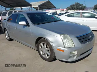 2005 Cadillac STS z VIN 1G6DW677350224198, wystawiony jako IAAI lot #42321639 z przebiegiem 122 208 mil mil oraz . Historia ofert i sprzedaży dostępna na DreamBid. Obrazek 1.