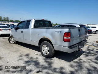 2007 Ford F-150 STX with VIN 1FTRX12W87FB51282, listed as a Copart auction lot 55580365 with 213,923 mi miles and Salvage title. Bid and sale history available at DreamBid. Image 2.