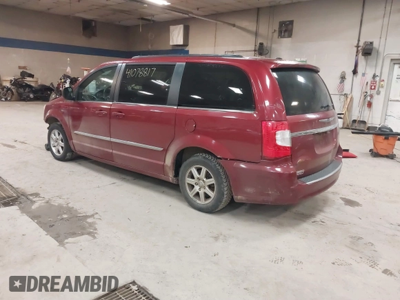 2012 Chrysler Town & Country Touring with VIN 2C4RC1BG1CR314023, listed as a IAAI auction lot 41078817 with Not Provided miles and . Bid and sale history available at DreamBid. Image 3.