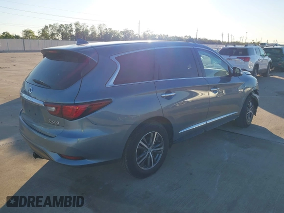 2019 Infiniti QX60 LUXE with VIN 5N1DL0MN1KC520817, listed as a IAAI auction lot 40931500 with 62,926 mi miles. Bid and sale history available at carsss.com. Image 4.