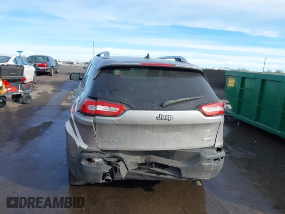 2014 Jeep Cherokee Latitude with VIN 1C4PJMCS9EW122196, listed as a IAAI auction lot 41649757 with 205,363 mi miles and . Bid and sale history available at DreamBid. Image 6.