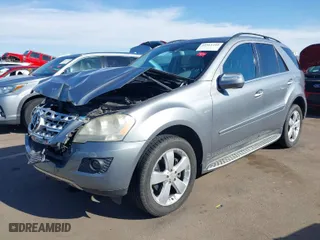 2010 Mercedes-Benz M-Class ML 350 with VIN 4JGBB5GB0AA570448, listed as a IAAI auction lot 41911210 with 166,489 mi miles. Bid and sale history available at carsss.com. Image 2.