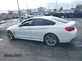 2019 BMW 4 Series 440i with VIN WBA4J5C52KBM65208, listed as a IAAI auction lot 41734154 with 52,477 mi miles and . Bid and sale history available at DreamBid. Image 15.