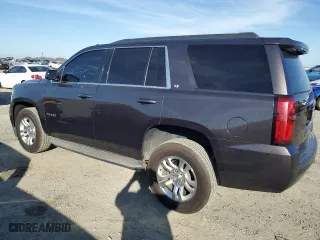 2015 Chevrolet Tahoe LT with VIN 1GNSCBKC8FR246289, listed as a Copart auction lot 47064375 with 102,331 mi miles and Salvage Title. Bid and sale history available at carsss.com. Image 2.