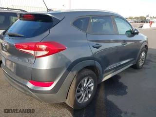 2017 Hyundai Tucson SE Plus with VIN KM8J33A47HU396149, listed as a IAAI auction lot 41391186 with 58,192 mi miles. Bid and sale history available at carsss.com. Image 4.