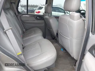 2005 GMC Envoy SLT with VIN 1GKDT13S352129944, listed as a IAAI auction lot 41527180 with 188,541 mi miles. Bid and sale history available at carsss.com. Image 8.