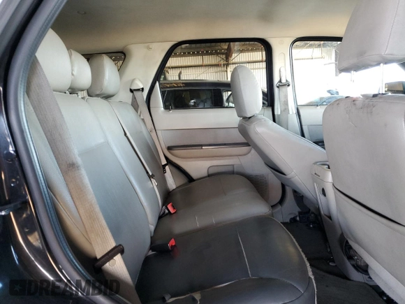 2011 Ford Escape Hybrid z VIN 1FMCU4K34BKC19594, wystawiony jako Copart lot #49479845 z przebiegiem 399 809 mil mil oraz Szkoda całkowita • Salvage title. Historia ofert i sprzedaży dostępna na DreamBid. Obrazek 11.