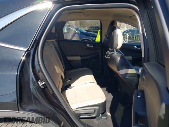2020 Ford Escape Titanium z VIN 1FMCU9J98LUA44923, wystawiony jako IAAI lot #41779691 z przebiegiem 73 259 mil mil oraz . Historia ofert i sprzedaży dostępna na DreamBid. Obrazek 8.