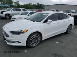 2018 Ford Fusion Titanium с VIN 3FA6P0D99JR212398, выставлен на аукционе Copart как лот 54390995 с пробегом 184 459 миль миль и Чистый • Clean title. История ставок и продаж доступна на DreamBid. Изображение 1.