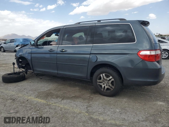 2005 Honda Odyssey EX-L with VIN 5FNRL38645B049087, listed as a Copart auction lot 56891275 with 194,587 mi miles and Salvage title. Bid and sale history available at DreamBid. Image 2.