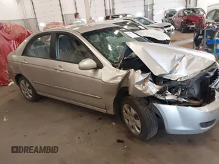 2009 Kia Spectra EX z VIN KNAFE222595648940, wystawiony jako IAAI lot #41896342 z przebiegiem 149 637 mil mil oraz . Historia ofert i sprzedaży dostępna na DreamBid. Obrazek 1.