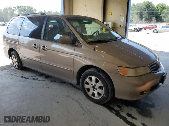 2003 Honda Odyssey EX-L with VIN 5FNRL18963B087397, listed as a Copart auction lot 62392415 with 261,737 mi miles and Salvage title. Bid and sale history available at DreamBid. Image 4.