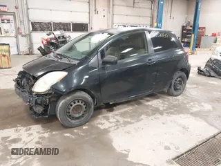 2008 Toyota Yaris with VIN JTDJT923285196299, listed as a IAAI auction lot 42152850 with 214,238 mi miles. Bid and sale history available at carsss.com. Image 2.