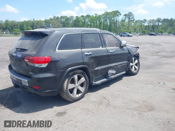 2015 Jeep Grand Cherokee Overland with VIN 1C4RJFCT9FC859740, listed as a IAAI auction lot 42187933 with 231,481 mi miles. Bid and sale history available at carsss.com. Image 4.