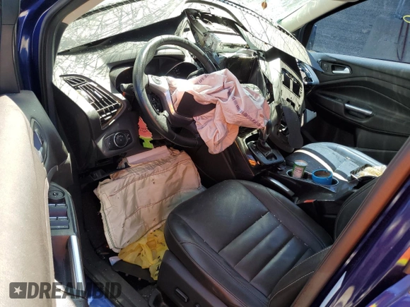 2015 Ford Escape Titanium with VIN 1FMCU9J90FUA70923, listed as a Copart auction lot 49832155 with 142,600 mi miles and Salvage title. Bid and sale history available at DreamBid. Image 8.