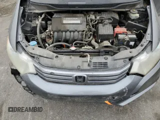 2010 Honda Insight EX with VIN JHMZE2H79AS017647, listed as a Copart auction lot 53311325 with 94,999 mi miles and Salvage Title. Bid and sale history available at DreamBid. Image 13.
