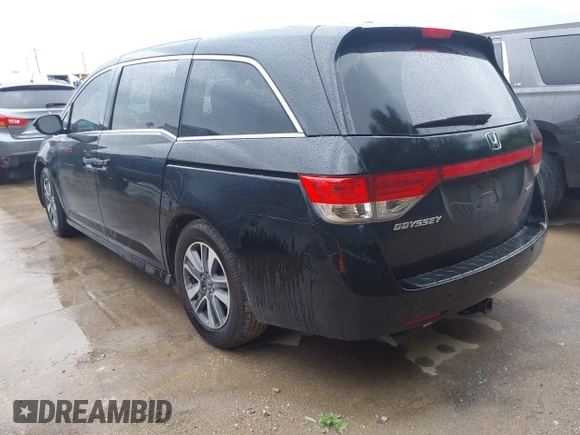 2016 Honda Odyssey Touring Elite with VIN 5FNRL5H93GB056038, listed as a IAAI auction lot 42185405 with Not Provided miles. Bid and sale history available at carsss.com. Image 3.