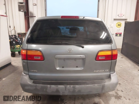 1999 Toyota Sienna CE with VIN 4T3GF19C5XU139787, listed as a IAAI auction lot 41167781 with 217,715 mi miles. Bid and sale history available at carsss.com. Image 16.