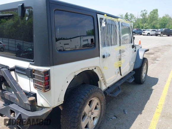 2015 Jeep Wrangler Unlimited Rubicon z VIN 1C4BJWFGXFL755810, wystawiony jako IAAI lot #42495531 z przebiegiem 109 668 mil mil oraz . Historia ofert i sprzedaży dostępna na DreamBid. Obrazek 18.