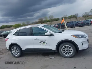 2020 Ford Escape SE with VIN 1FMCU9G67LUC31633, listed as a IAAI auction lot 42173290 with 136,937 mi miles and . Bid and sale history available at DreamBid. Image 13.