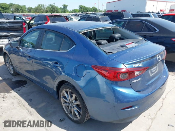 2018 Mazda 3 Touring with VIN 3MZBN1V38JM206827, listed as a IAAI auction lot 41983631 with 51,303 mi miles and . Bid and sale history available at DreamBid. Image 3.