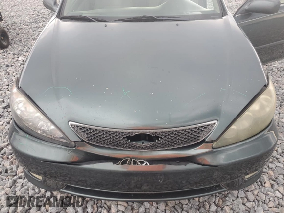 2005 Toyota Camry LE with VIN 4T1BE30K65U038423, listed as a Copart auction lot 64276255 with 182,686 mi miles and Salvage title. Bid and sale history available at DreamBid. Image 11.